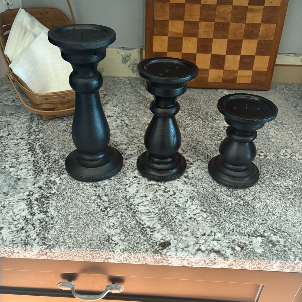 Three candle holders